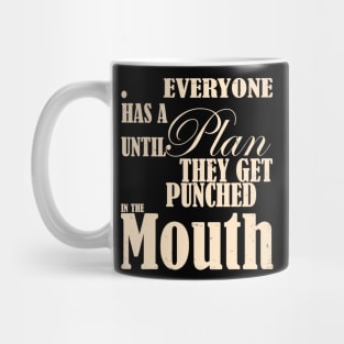 Everyone Has A Plan Until They Get Punched Mug